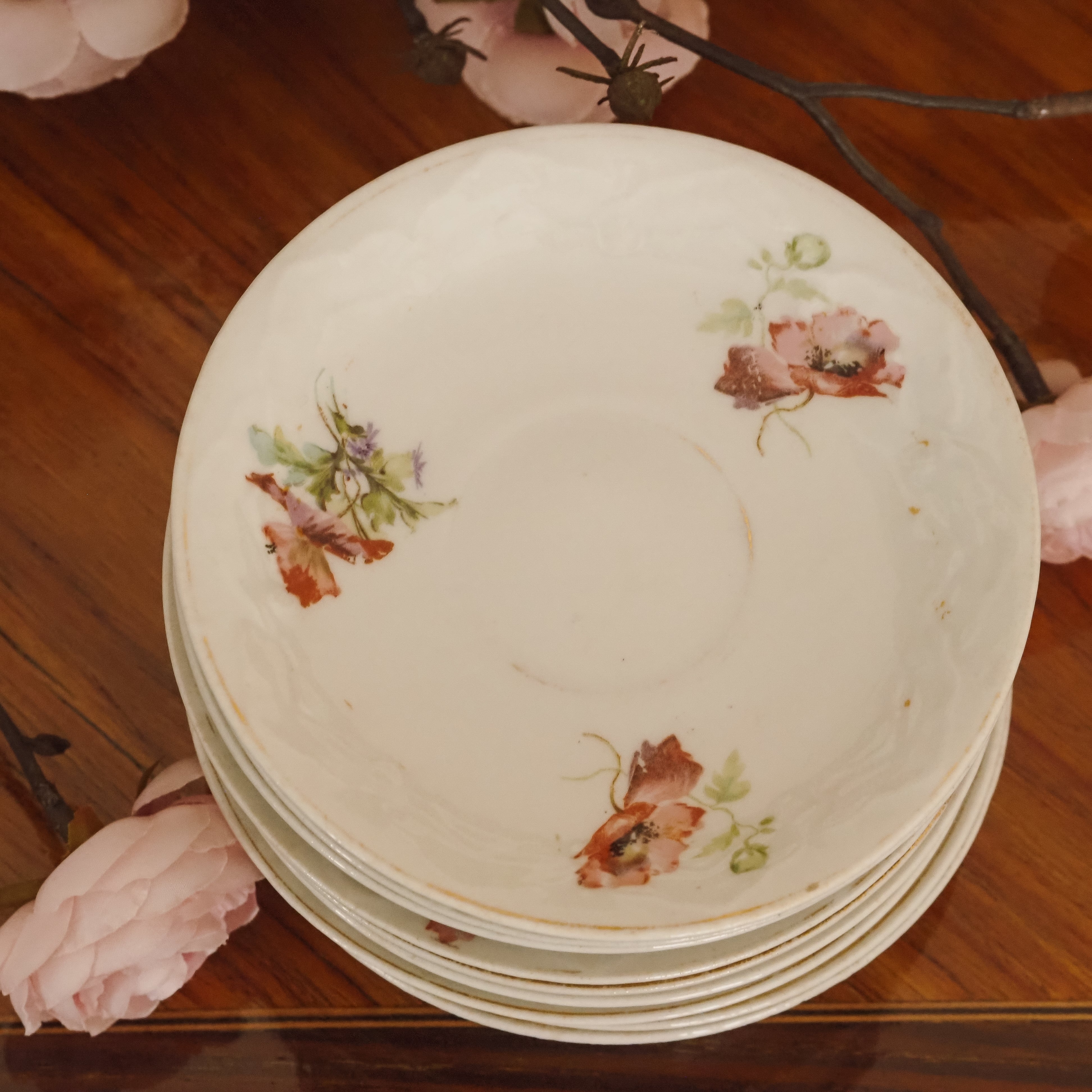 Unterteller-Set · Florales Porzellan mit Mohndekor um 1900