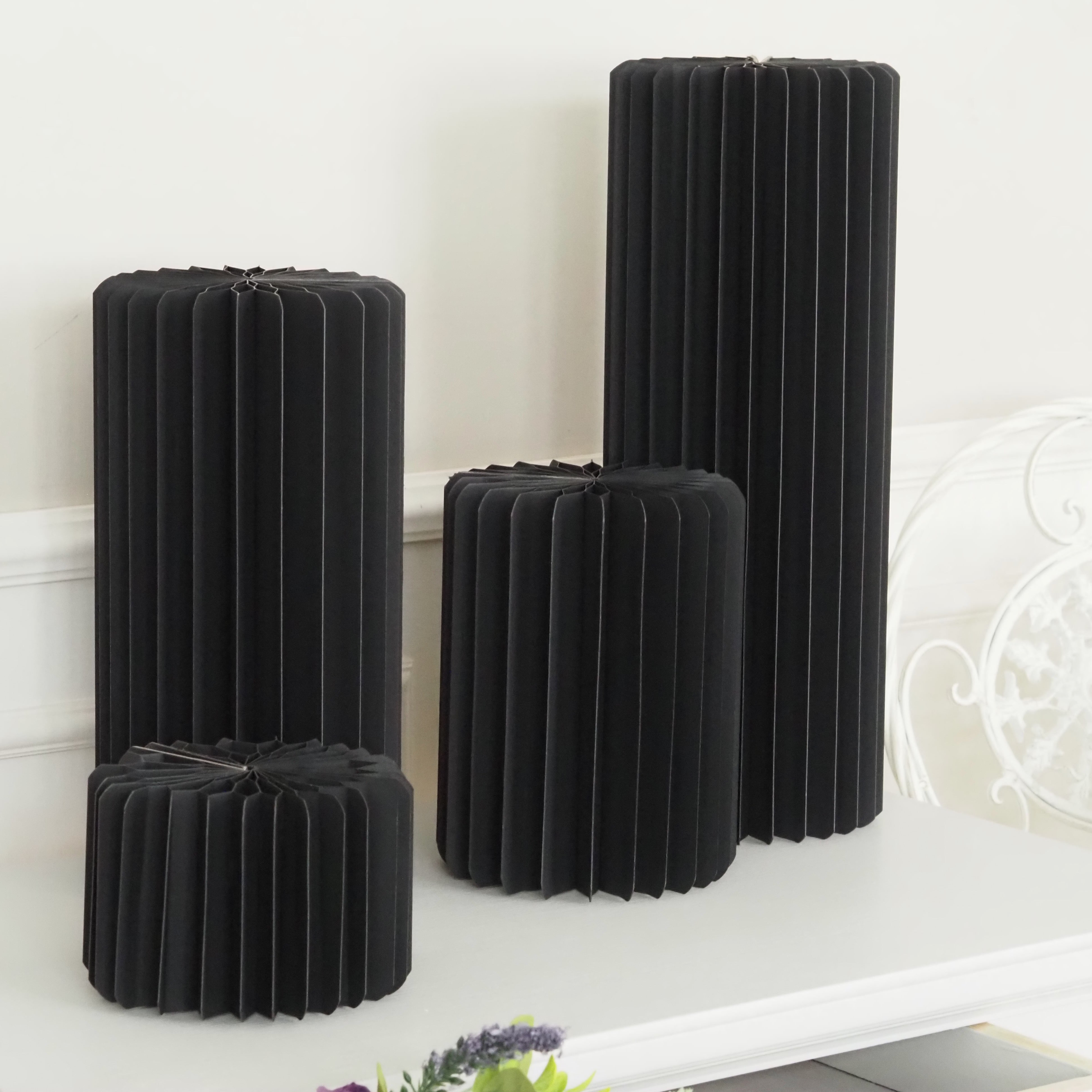 Papiersäule Mini · Set/4 · H 10–40 cm · VARIABLE: Schwarz / Creme