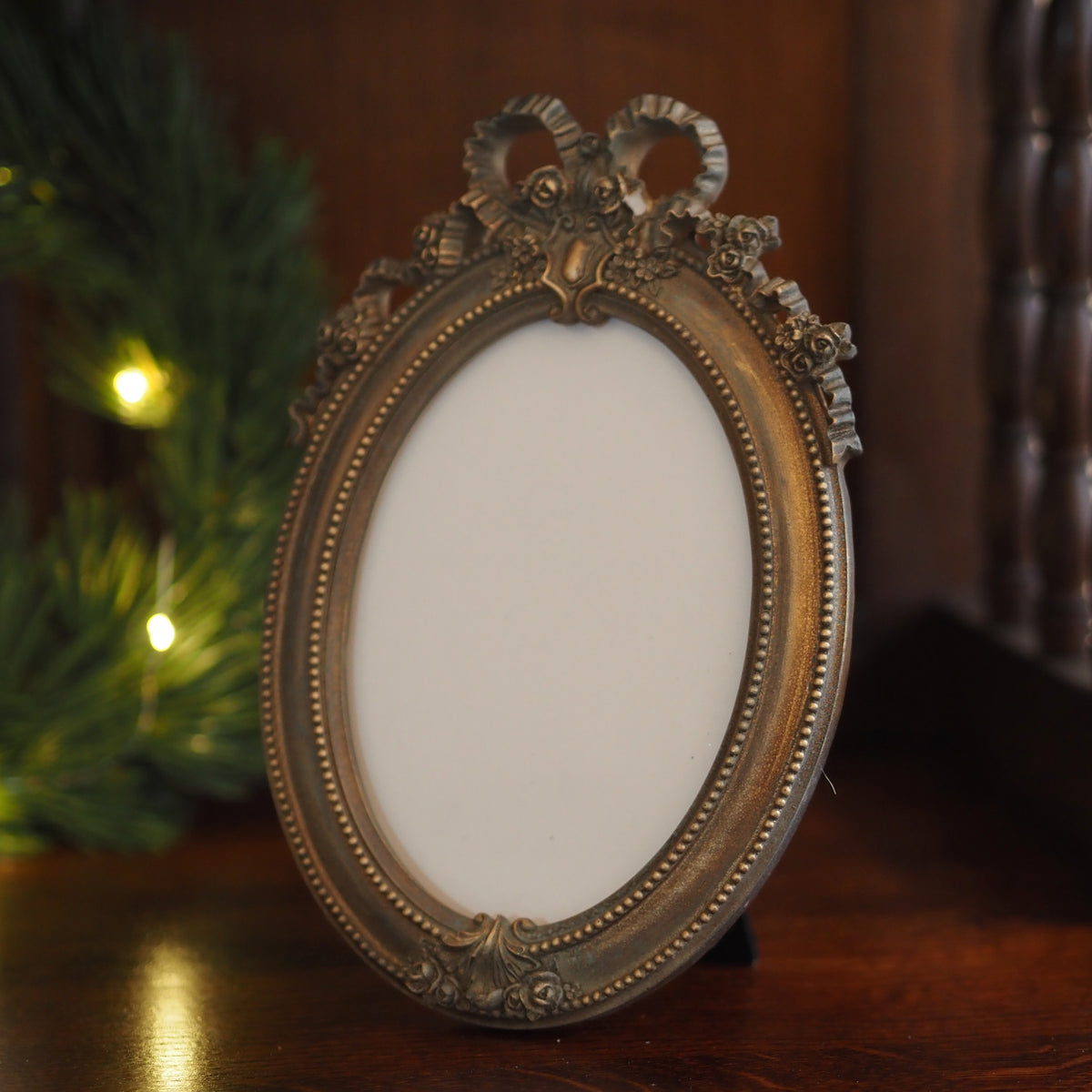 Fotorahmen 13x18 Oval · Louis-seize Schleife Altgold-Optik