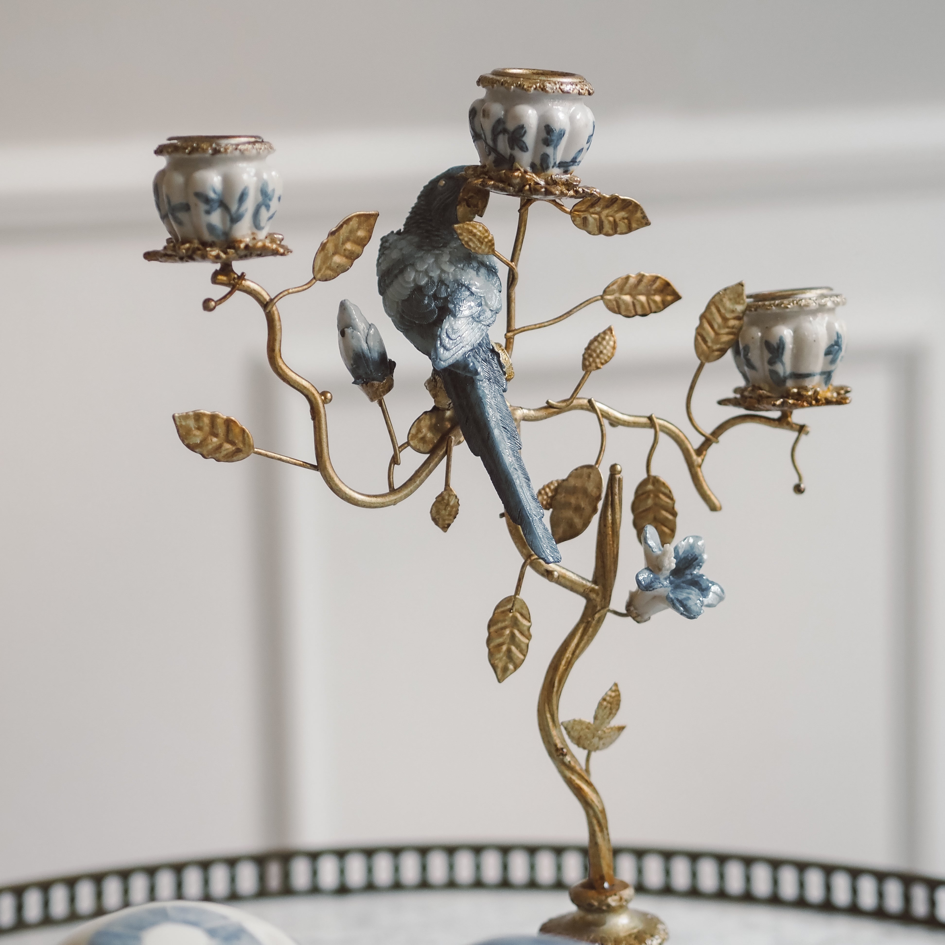Kerzenständer mit Vogelmotiv · naturinspirierter Historismus